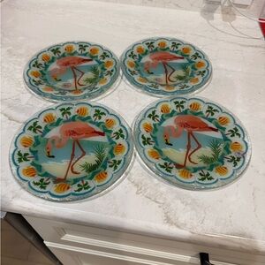 Vintage Peggy Karr fused glass plates feature a colorful flamingo design